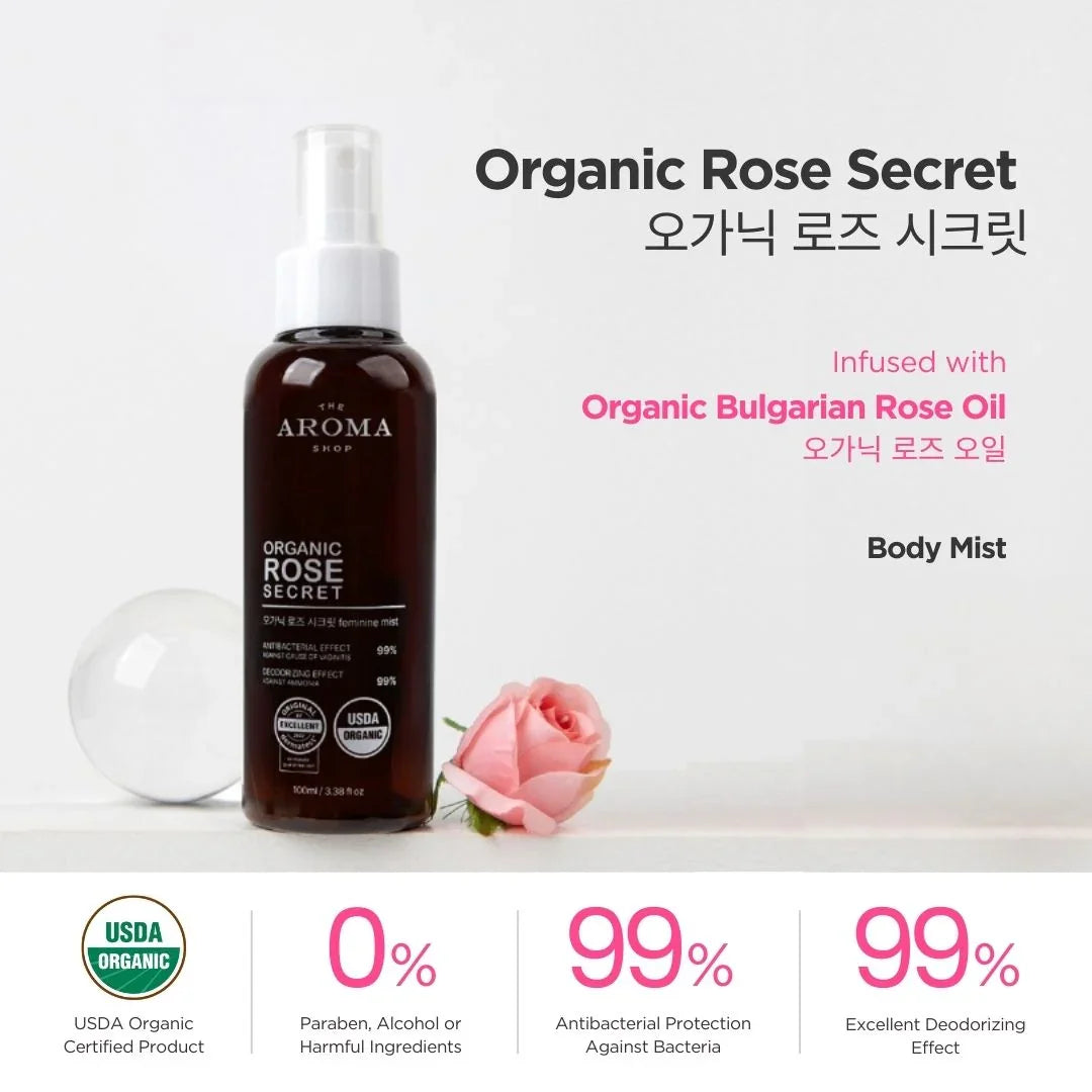Organic Rose Secret body mist bottle with a rose on a white background