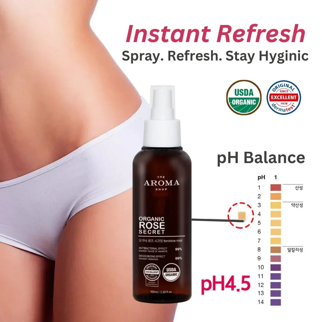 Organic rose secret spray bottle with pH balance indicator on a blurred background