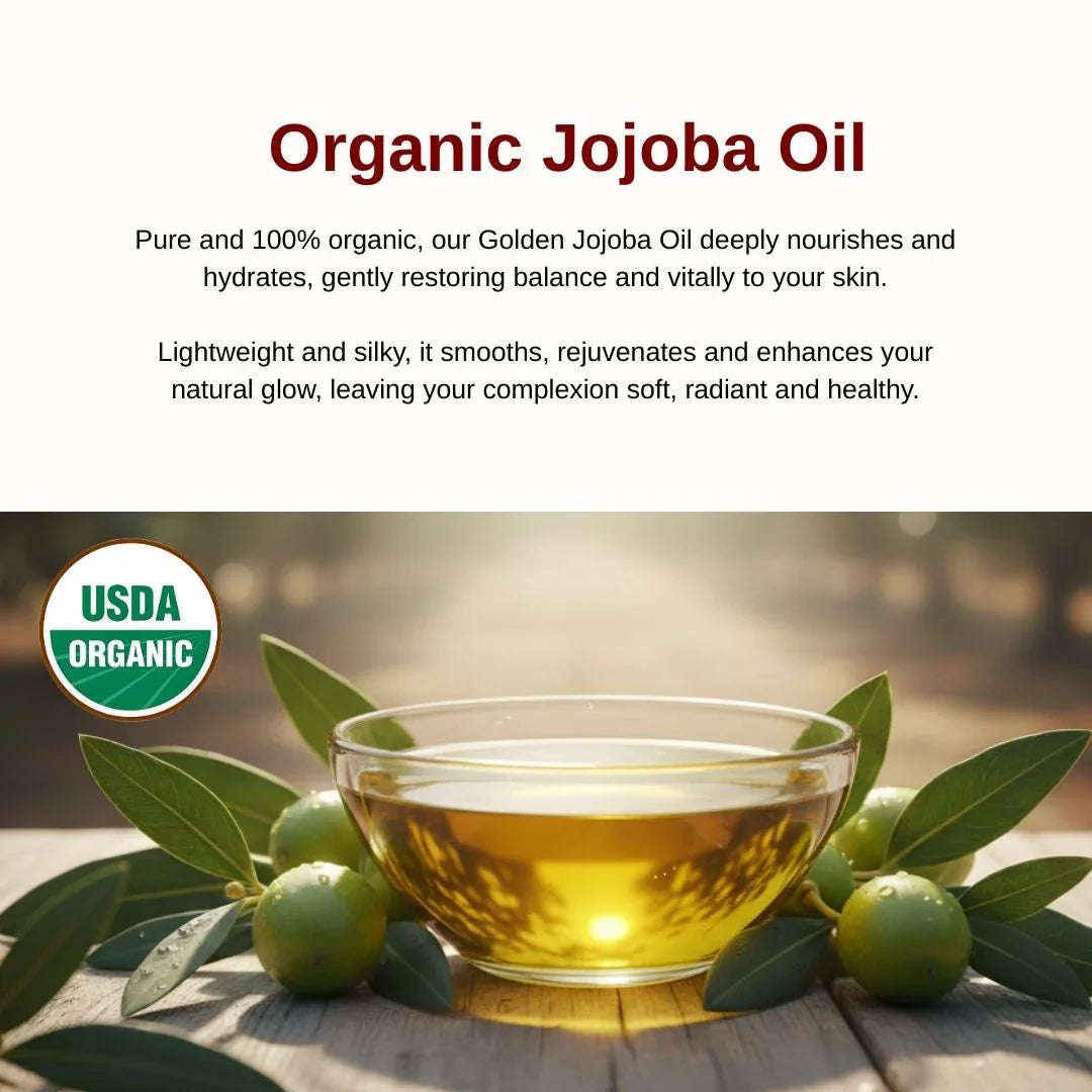 Glass bowl of organic jojoba oil with jojoba beans and leaves on a wooden surface, USDA Organic label visible.