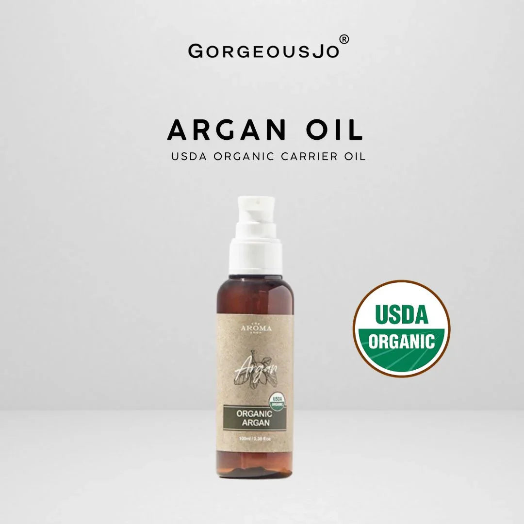 Bottle of Organic Argan Oil with USDA Organic label on a white background