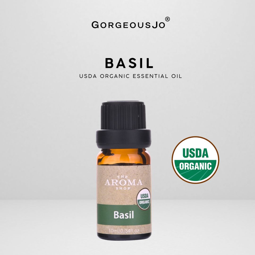 Basil USDA organic essential oil bottle with 'Gorgeousjo' branding on a light gray background