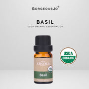 Basil USDA organic essential oil bottle with 'Gorgeousjo' branding on a light gray background