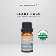 Clary Sage essential oil bottle with USDA Organic label on a gray background