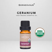 Geranium essential oil bottle with USDA Organic label on a white background