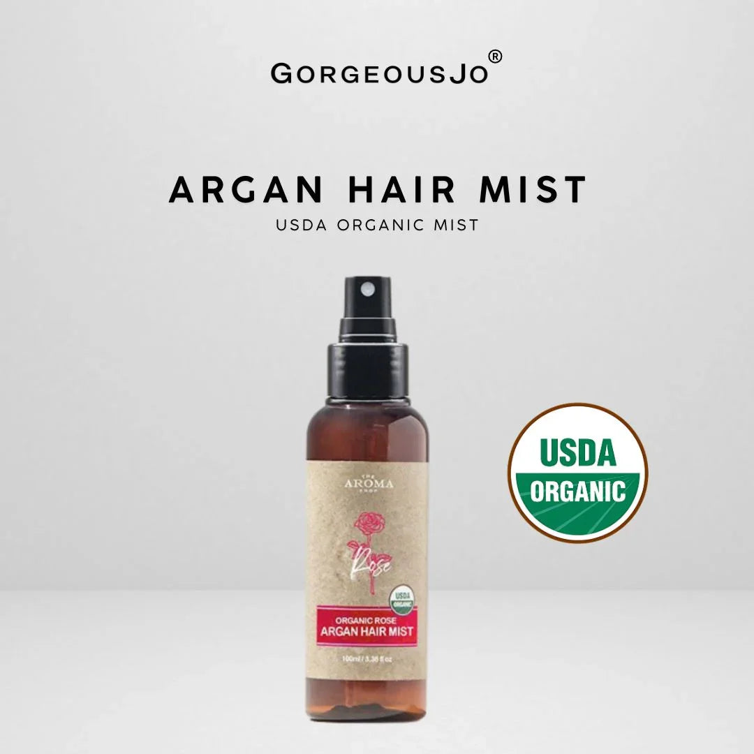 Argan hair mist bottle with USDA Organic label on a white background