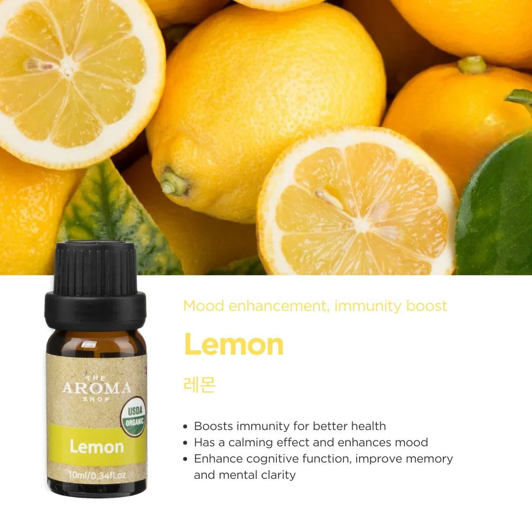 Lemon essential oil bottle with lemons in the background