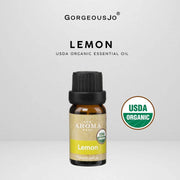 Lemon USDA organic essential oil bottle with 'Gorgeousjo' branding on a light gray background