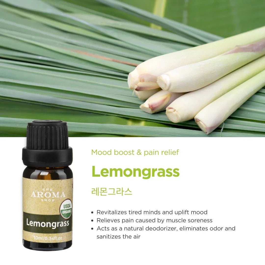 Lemongrass essential oil bottle with fresh lemongrass stalks on a green leaf background