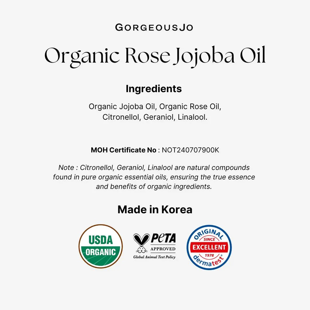 Product label for Organic Rose Jojoba Oil with ingredients, certification details, and logos on a white background.
