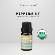 Peppermint USDA organic essential oil bottle with 'Gorgeousjo' branding on a light gray background.