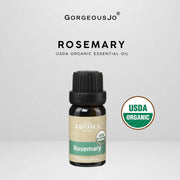 Rosemary USDA organic essential oil bottle with visible brand logo on a light gray background