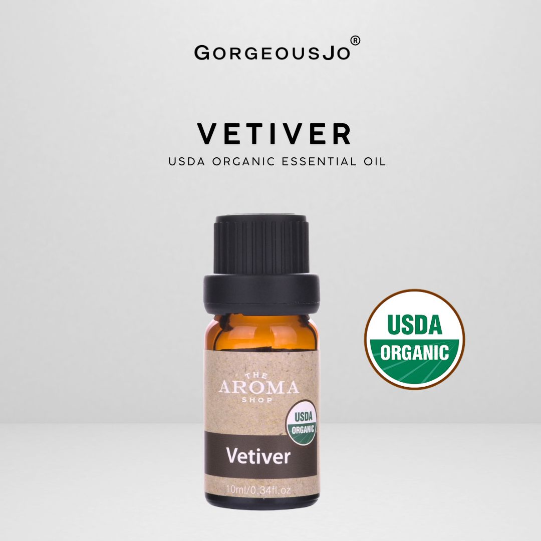 Vetiver essential oil bottle with USDA Organic label on a white background